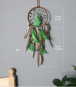 Handmade green feather dream catcher wall decor with dimensions and weight info.