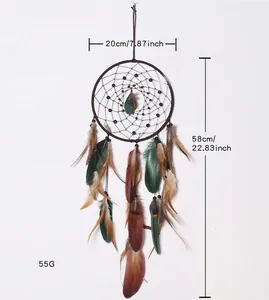 Handmade bohemian dream catcher with brown and green feathers, 58cm total length.