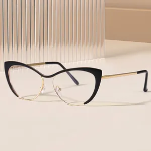 Occhiali retrò cat-eye anti-luce blu con montatura in metallo nero e oro elegante