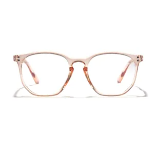 Close-up view of retro peach transparent eyeglass frame on white background