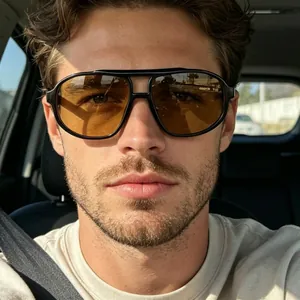 Vintage double-bridge aviator sunglasses with black frame and amber tinted lenses