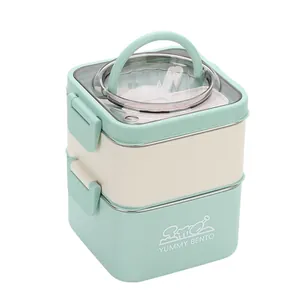 Portable double-layer stainless steel bento box with handle in mint green and cream