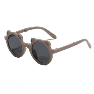 Adorable bear-shaped foldable sunglasses for children in a stylish mocha brown finish