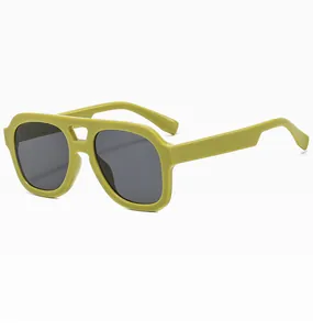 Detail shot of retro oversized square sunglasses in olive green frame