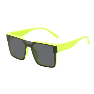 Stylish neon green kids square sunglasses with dark lenses providing UV protection