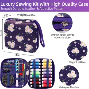 Complete sewing kit in purple daisy pattern leather case with tools and thread spools