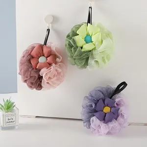 Spugna da bagno a rete morbida a forma di fiore in eleganti e vivaci colori pastello