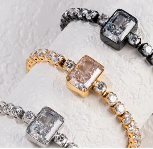Detailed view of tennis bracelets with large emerald-cut ice crushed cubic zirconia