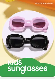 Close-up detail of stylish kids bubble frame sunglasses in pink and black macaron colors