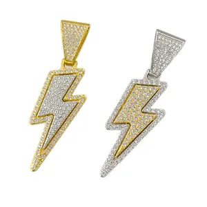 Iced out hip hop lightning bolt pendants with pavé set crystals in gold and silver