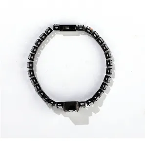 Detailed view of an elegant black-framed bracelet with square-cut crushed ice zircons