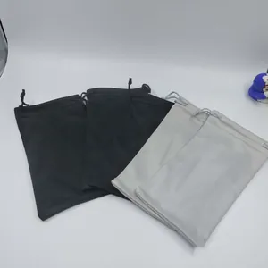 Portable microfiber drawstring pouches in black and grey for sunglasses and accessories