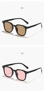 Vue détaillée de lunettes de soleil rétro carrées avec des verres marron et rose clair