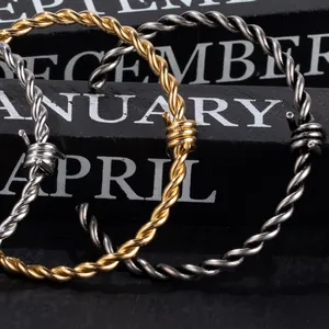 Hip hop style titanium steel twisted wire cuff bracelets in gold and silver tones