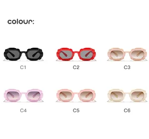 Detail view showing six different macaron colors of children bubble frame sunglasses