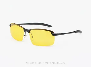 Detail view of stylish yellow lens night vision driving sunglasses for men with black frame