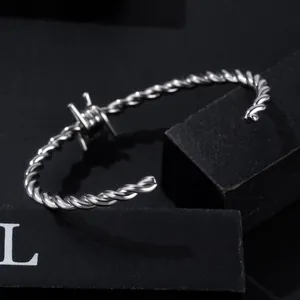 Silver-toned titanium steel barbed wire twisted cuff bracelet for men's hip hop style