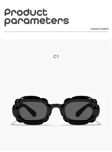 Detail view of children's sunglasses with a unique black bubble rectangle frame