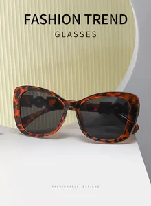 Detail view of elegant tortoise shell cat-eye sunglasses for women with large PC frame