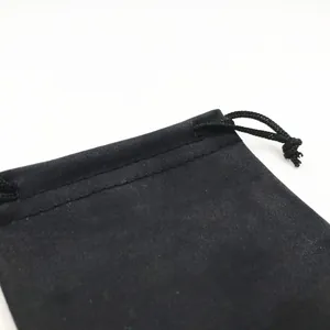 Close-up of the black microfiber drawstring pouch for retro sunglasses storage