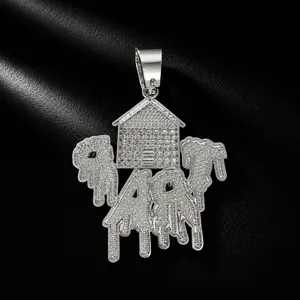 Detailed macro shot of silver iced out TRAP house pendant with unique dripping letters