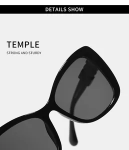 Detailed macro shot of durable black PC cat-eye sunglasses temple and frame