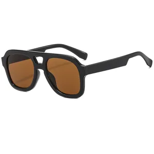 Retro double-bridge oversized square sunglasses with black frame and brown lenses.
