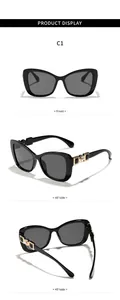Detailed product views of elegant black cat-eye sunglasses with gold temple accents