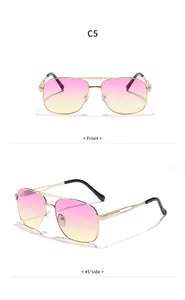 Detail view of retro double bridge metal sunglasses with pink gradient lenses.