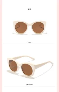 Vue de face et à 45 degrés de lunettes de soleil œil-de-chat crème pour enfants.