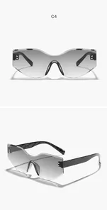 Detailed view showing the front and side profile of grey gradient rimless sunglasses