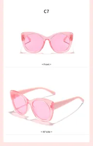 Vue détaillée de lunettes de soleil roses à paillettes pour enfants de face et de profil.