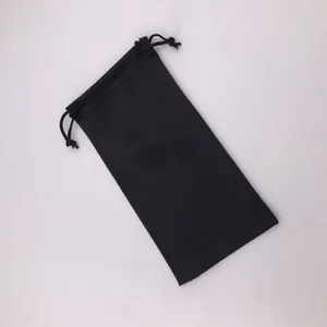 Detail shot of a black microfiber drawstring pouch for eyewear and jewelry storage