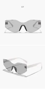 Front and side detail views of irregular grey rimless cat-eye sunglasses with white temples