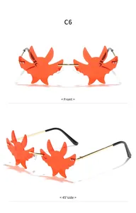Detailansicht der orangefarbenen randlosen Fledermaus-Sonnenbrille von vorne und der Seite