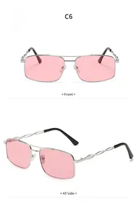 Detailansicht der silbernen eckigen Metallsonnenbrille mit rosa Gläsern und Bügeln