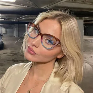 Elegant cat-eye blue light blocking glasses featuring gradient brown and blue frames
