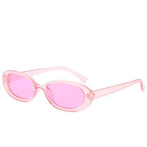 Lunettes de soleil ovales transparentes roses à petite monture pour un look chic et tendance
