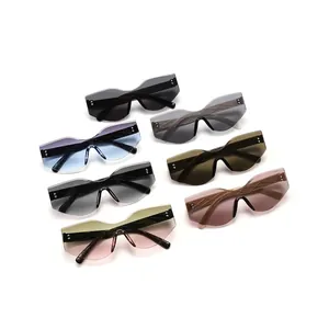 Professional oversized irregular cat-eye sunglasses featuring colorful gradient lenses