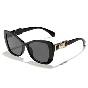 Elegant black cat eye sunglasses for women with luxury gold pearl temple details