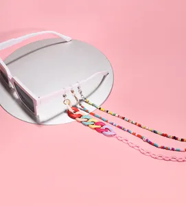 Close-up detail of colorful acrylic candy-colored eyeglass and mask lanyard chains