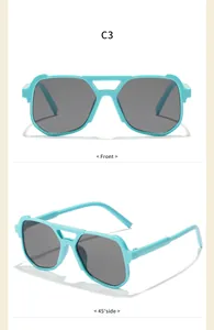 Detailansicht der blauen Doppelsteg-Sonnenbrille für Kinder mit grauen Gläsern