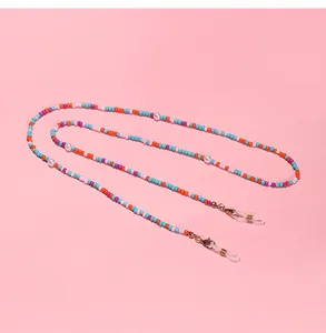 Detailed view of candy-colored acrylic beaded chain for glasses or face masks accessory