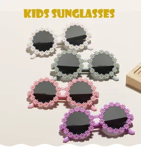 Lunettes de soleil pour enfants en forme de fleur en quatre couleurs avec verres UV