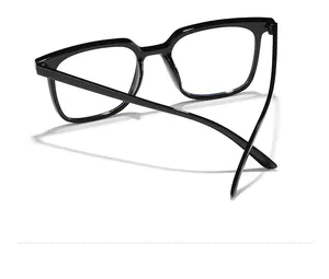 Detail view of stylish black large-frame anti-blue light glasses with a glossy finish.