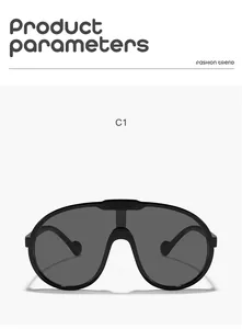 Vue détaillée de lunettes de soleil bouclier pour enfants avec monture noire et verres gris