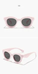 Front and side view of pink bubble frame children's sunglasses with dark lenses