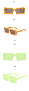 Viste frontali e laterali di occhiali da sole rettangolari arancioni e verde neon.