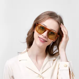 Lunettes de soleil ovales à la mode avec verres jaunes et monture orange