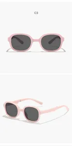 Children's foldable sunglasses featuring pink retro square frame and dark protective lenses